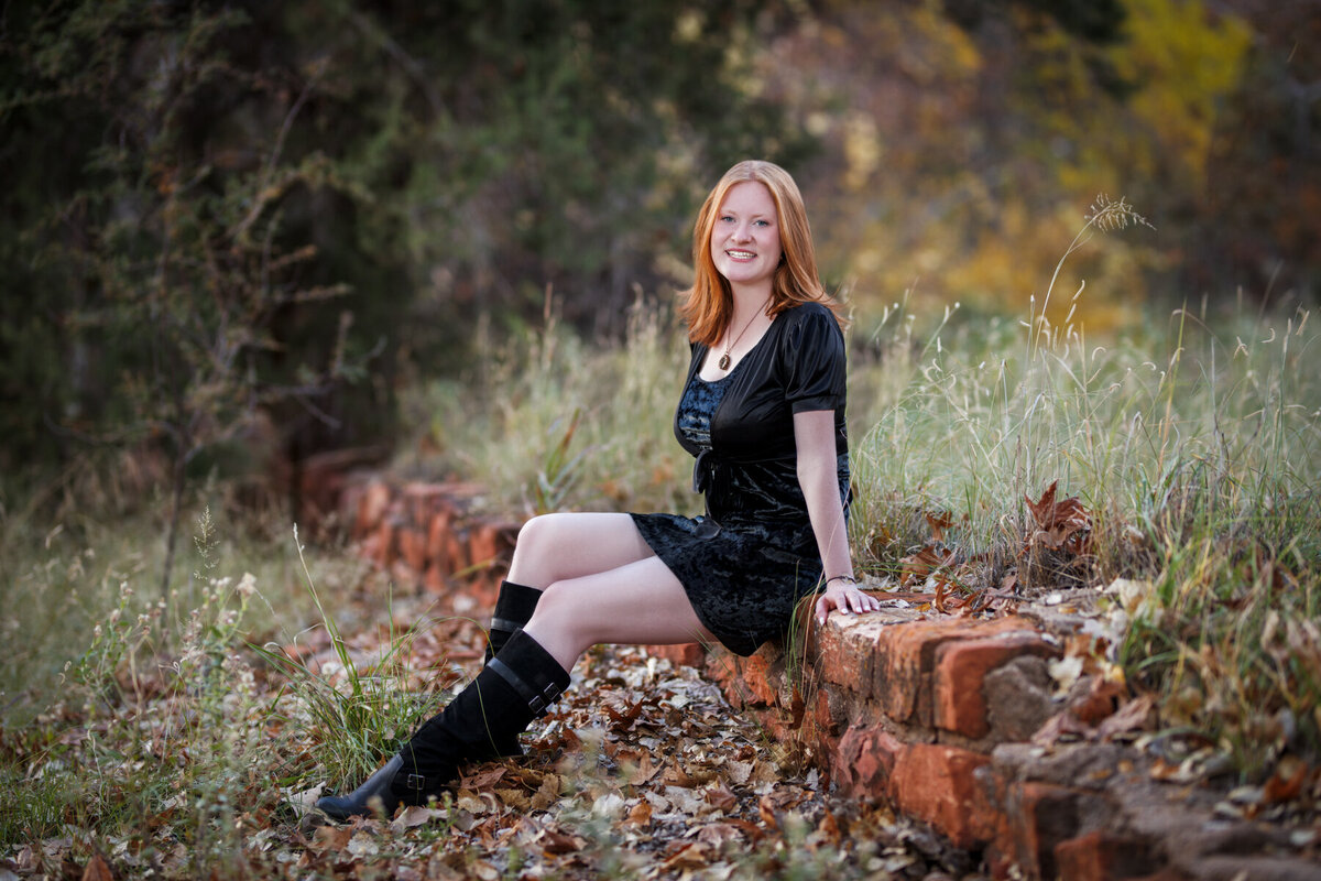 Woman in black velvet dress